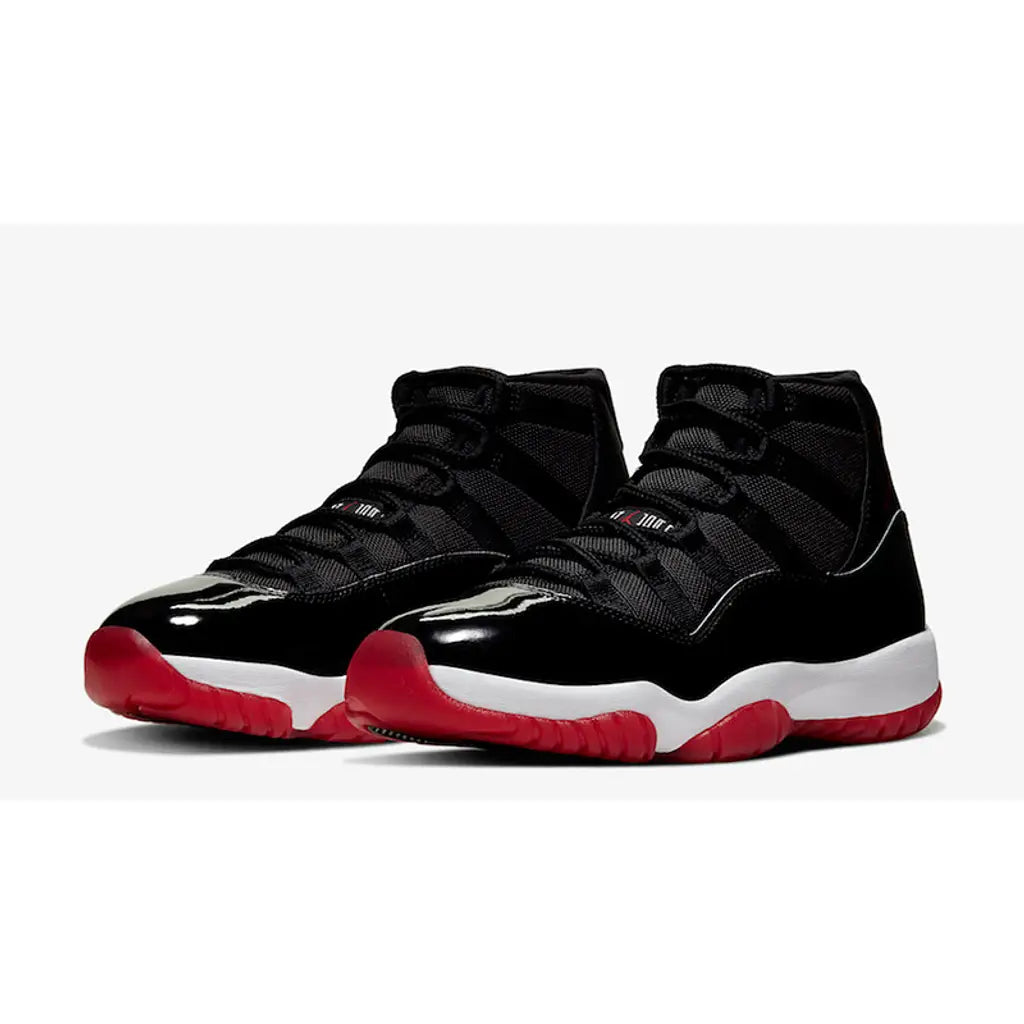 Air Jordan 11 Bred – Iconic Black and Red Leather Design