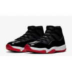 Air Jordan 11 Bred – Iconic Black and Red Leather Design