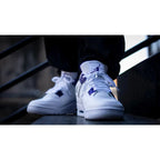 Air Jordan 4 Retro Metallic Purple – Iconic Silhouette with Vibrant Purple Accents