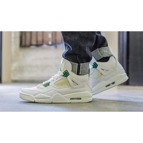 Air Jordan 4 Retro Metallic Green – Classic Silhouette with Bold Green Accents