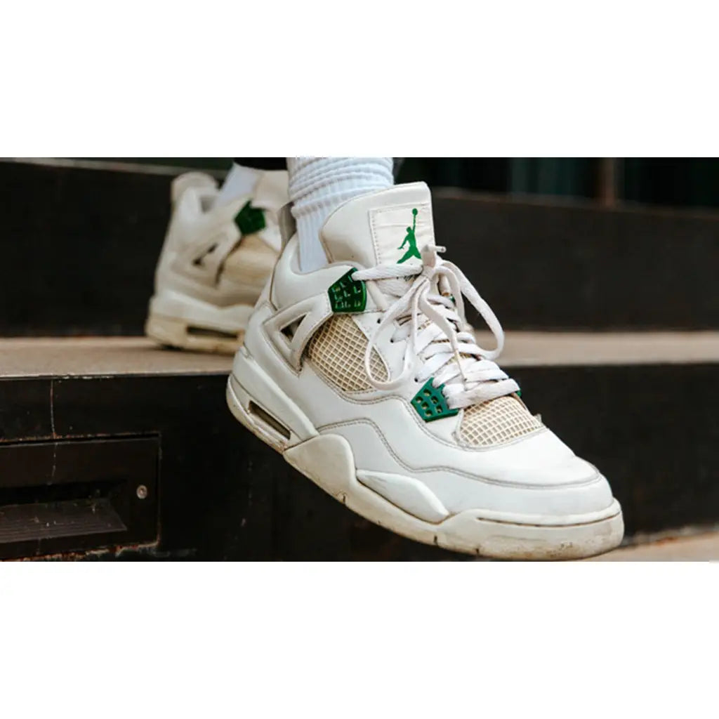 Air Jordan 4 Retro Metallic Green – Classic Silhouette with Bold Green Accents