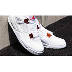 Air Jordan 4 Retro Metallic Orange – Bold Silhouette with Vibrant Orange Accents