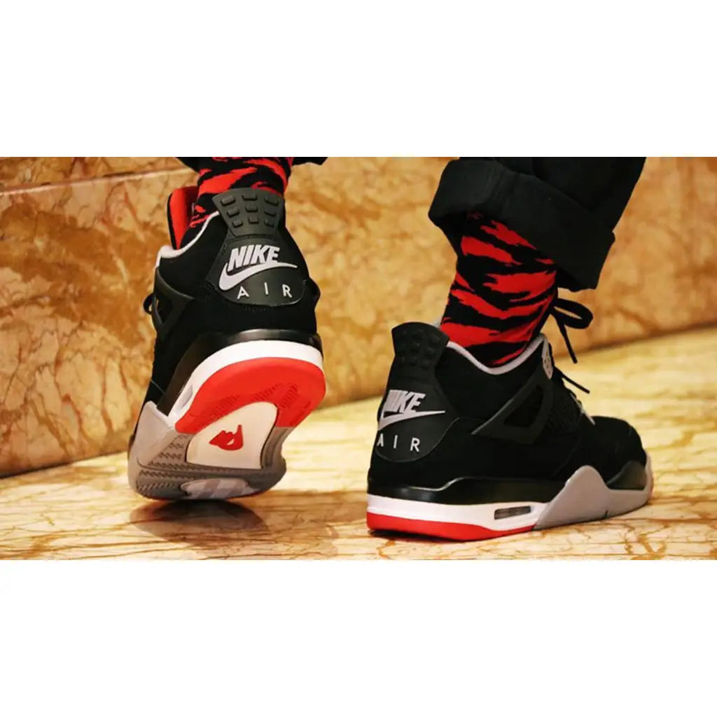 Air Jordan 4 Bred – Iconic Black and Red Colourway