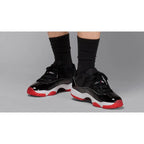 Air Jordan 11 Retro Low Bred – Iconic Black & Red Low-Top Design