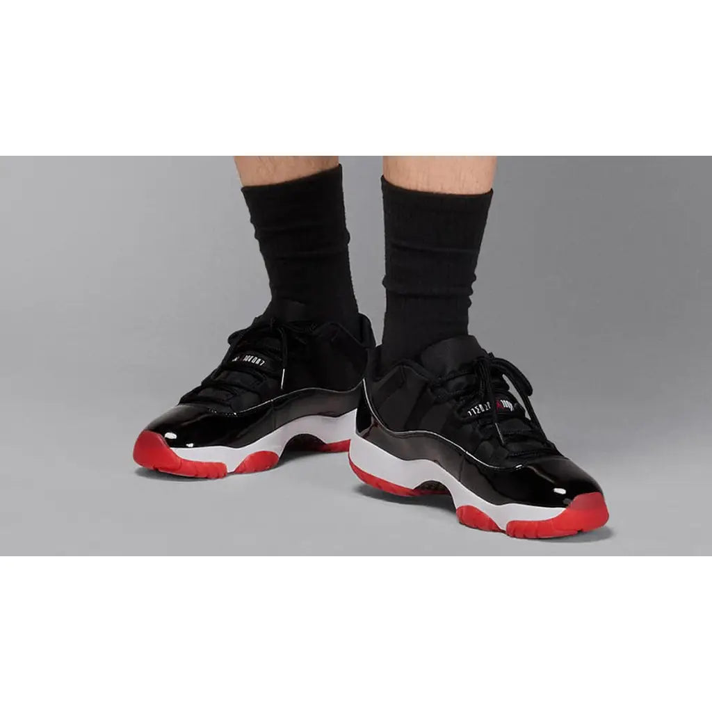 Air Jordan 11 Retro Low Bred – Iconic Black & Red Low-Top Design