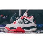 Air Jordan 4 Fire Red – Classic Silhouette with Bold Red Accents